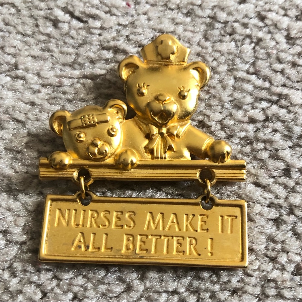 Cute gold tone nurse pin